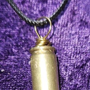 A 22-guage bullet casing with crystal and vinyl cording.