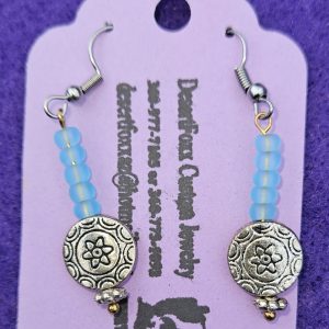 Approximately 1¼ inch with light blue beads and silver disk with silver findings.