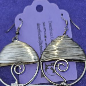 Approximately 1 ½ inch round silver stainless steel wire wrapped with stainless steel ear wires.