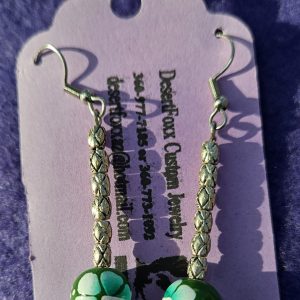 Hand painted green beads with half inch silver long beads total length 2 inches long with stainless steel wires.