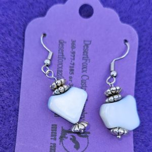 Approximately 1 1/2 inch two blue and white beads with silver findings with stainless steel ear wires.