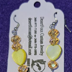 Approximately 2 inches, yellow heart beads with crystals and stainless steel ear wires.