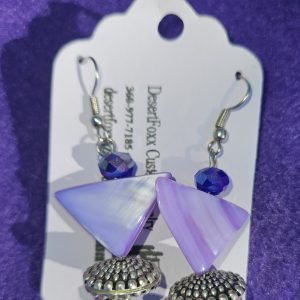 Approximately 2 inches long, purple triangles with flat silver findings and purple crystals with stainless steel ear wires.