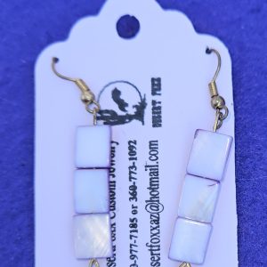 Approximately 2 3/8 inches long. Two-toned square beads that are white with purple sides and white simulated pearls.