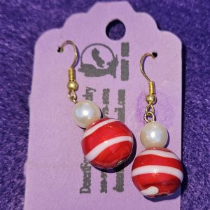 Approximately 1 1/2 inch long. Large red and white beads with white simulated pearls.