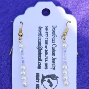 Approximately 1 5/8 inch long. Clear white crystal beads with simulated pearls.