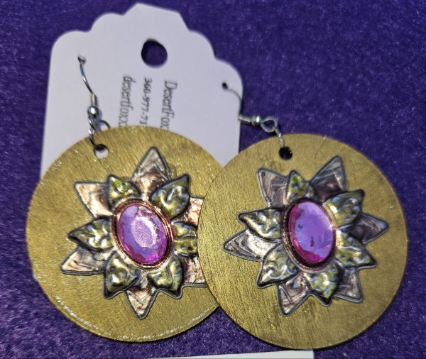 Approximately 2 inches long. Gold wooden disks with flower design and stainless ear wires.