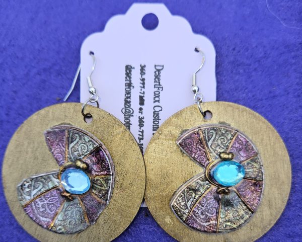 Approximately 2 inches long. Gold two inch wooden disks with stamps and mod-podge,