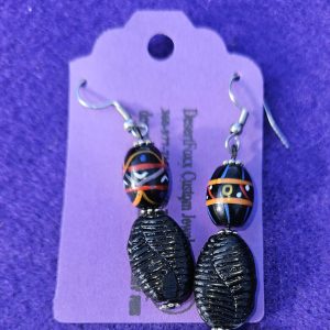 Approximately 2 1/4 inches with black textured beads with painted beads, silver findings, and stainless steel ear wires.