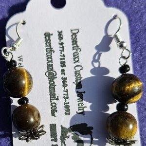 Approx. 1 3/4 inch, Cat Eye Beads with Silver Findings and Silver colored ear wire. $21.99
