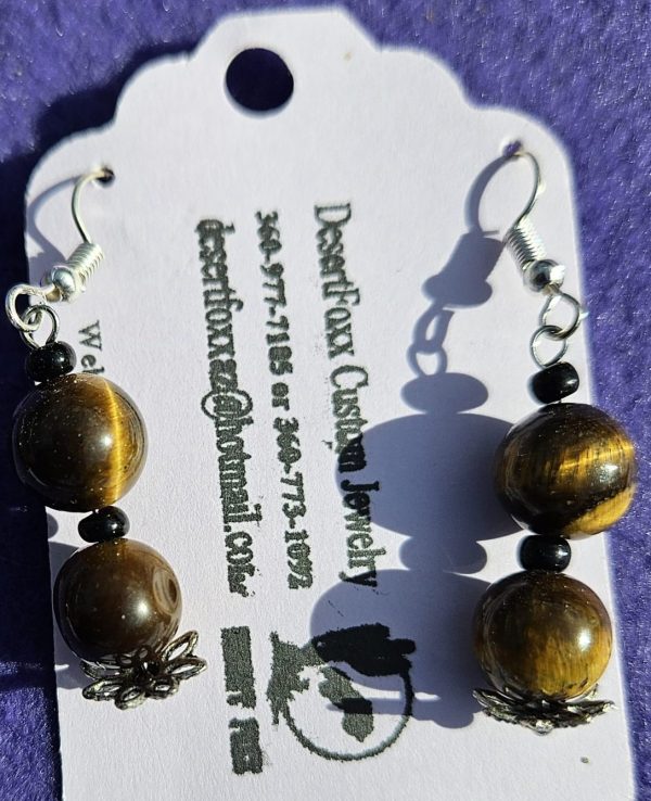 Approx. 1 3/4 inch, Cat Eye Beads with Silver Findings and Silver colored ear wire. $21.99