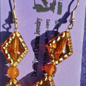 Approx. 2 1/8 inches Orange and Gold Beads with gold earwires.