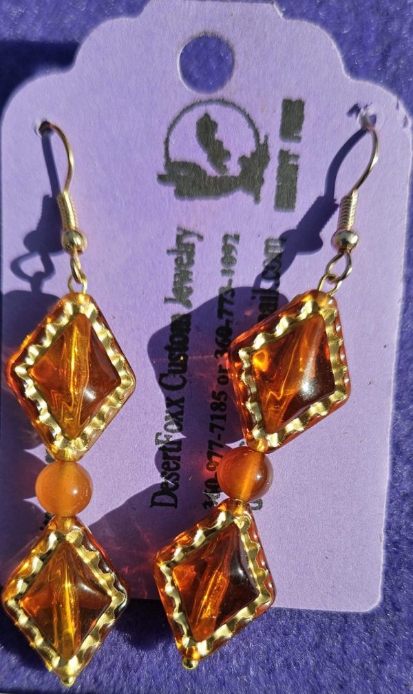 Approx. 2 1/8 inches Orange and Gold Beads with gold earwires.