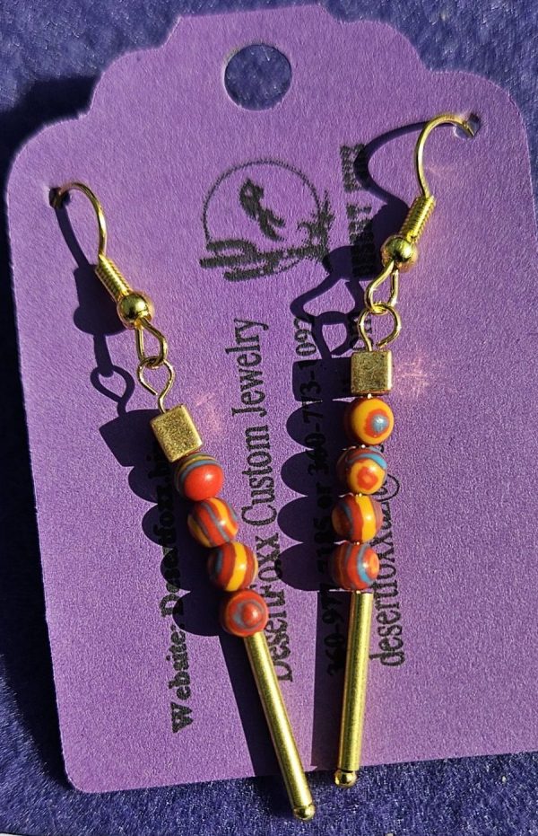 Aprox. 1 1/8 inch Orange and Blue/Yellow swirled 4 mm. beads with Gold findings and Gold ear wires.