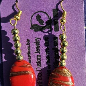 Approx. 2 3/8 inches Red Bead with gold glidder Design with 6 Gold round beads and Gold ear wires.