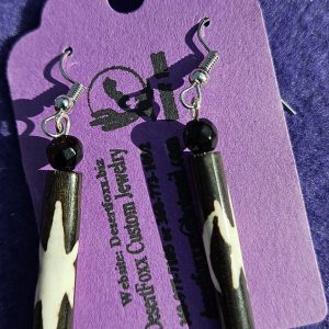 Approx. 2 3/8 inches, Long Brown Beads with Tan designs topped off with black round beads and silver colored ear wires.