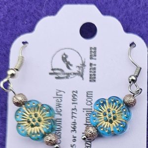 Approx. 1 ⅝ inch, Ice Blue Flower Beads trimmed with Gold and finished with round Gold textured Beads.