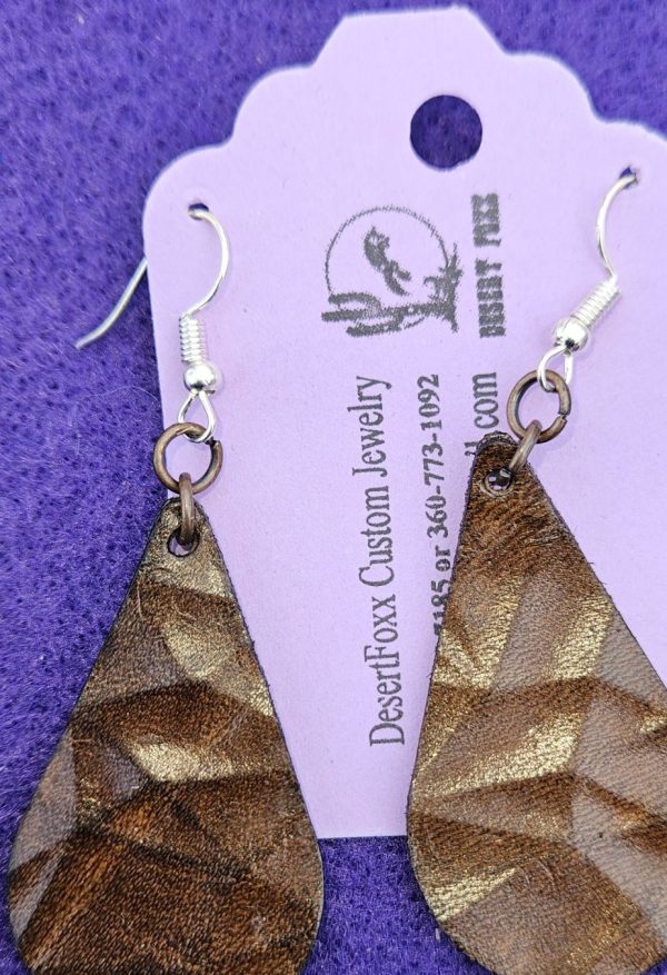 Approx. 2 ¼ inches, Brown Leather tear drop earrings with silver colored ear wires.
