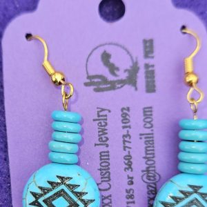 Approx. 1 ⅝ inch, Round Bead like circles dyed magnesite with small beads. With gold findings and gold colored ear wires.