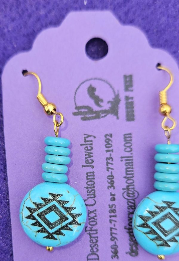 Approx. 1 ⅝ inch, Round Bead like circles dyed magnesite with small beads. With gold findings and gold colored ear wires.
