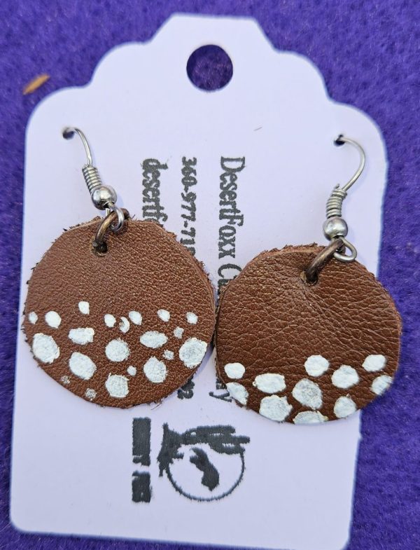 Approx. 1 ½ inch, Round Brown Leather Disc with Hand Painted Design.