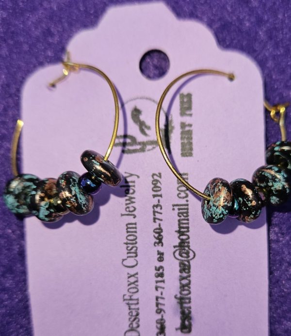 Approx. 1” inch, Round Gold Colored Wire with iridescent beads. $21.99