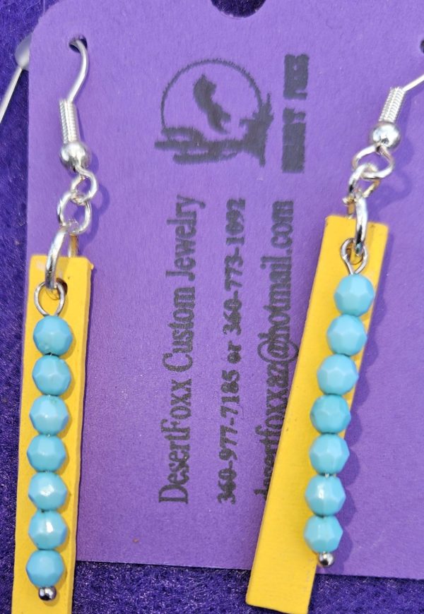 Approx. 1 ⅞ inch, Hand Painted Wooden Strip with turquoise mini beads with silver colored wires. $19.99