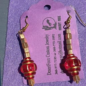 Approx. 2 1/8 inchs Clear red beads with Gold Trim.