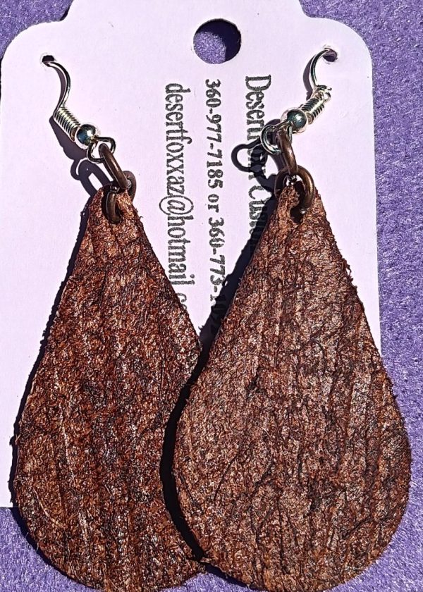 Approx. 2 1/2 inches Brown Leather with Hand Texturing.