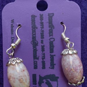 Approx. 1 3/8 inches Egg shaped pinkish beads with silver findings.