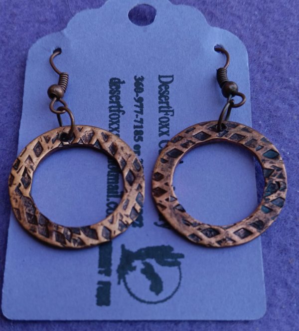 Approx. 1 3/8 inches Copper washers with hammered designs with pantina and copper findings.