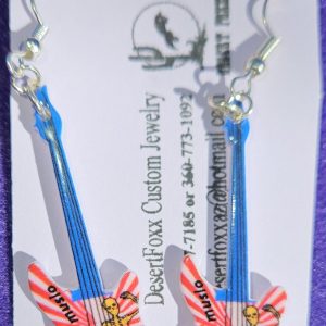 Approx. 2 5/8 inches Plastic Guitar multicolored with silver ear wires. 21.99