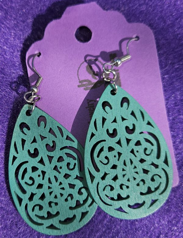 Approx. 2 5/8 inches, Green brocade wooden earrings with silver ear wires. 23.99
